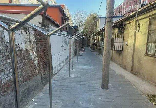 搭乱建居民想提升小区环境的愿望实现了k8凯发马竞赞助拆除700平方米私